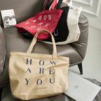 LETTER ANGLED ZIPPER BAG